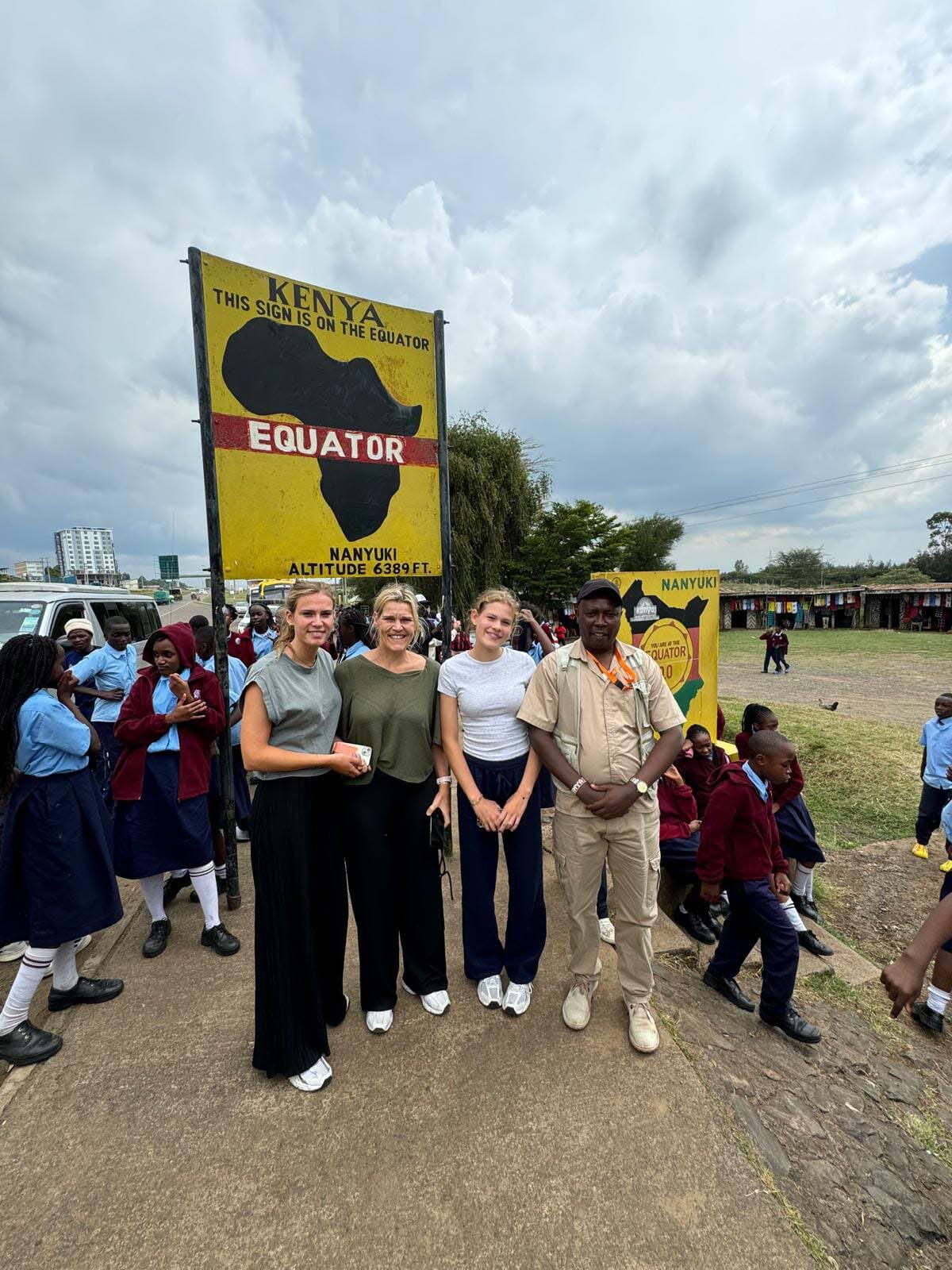 Emars-Transport-and-Tours-Clients-On-A-Road-Trip-to-Nanyuki-Equator-Landmark